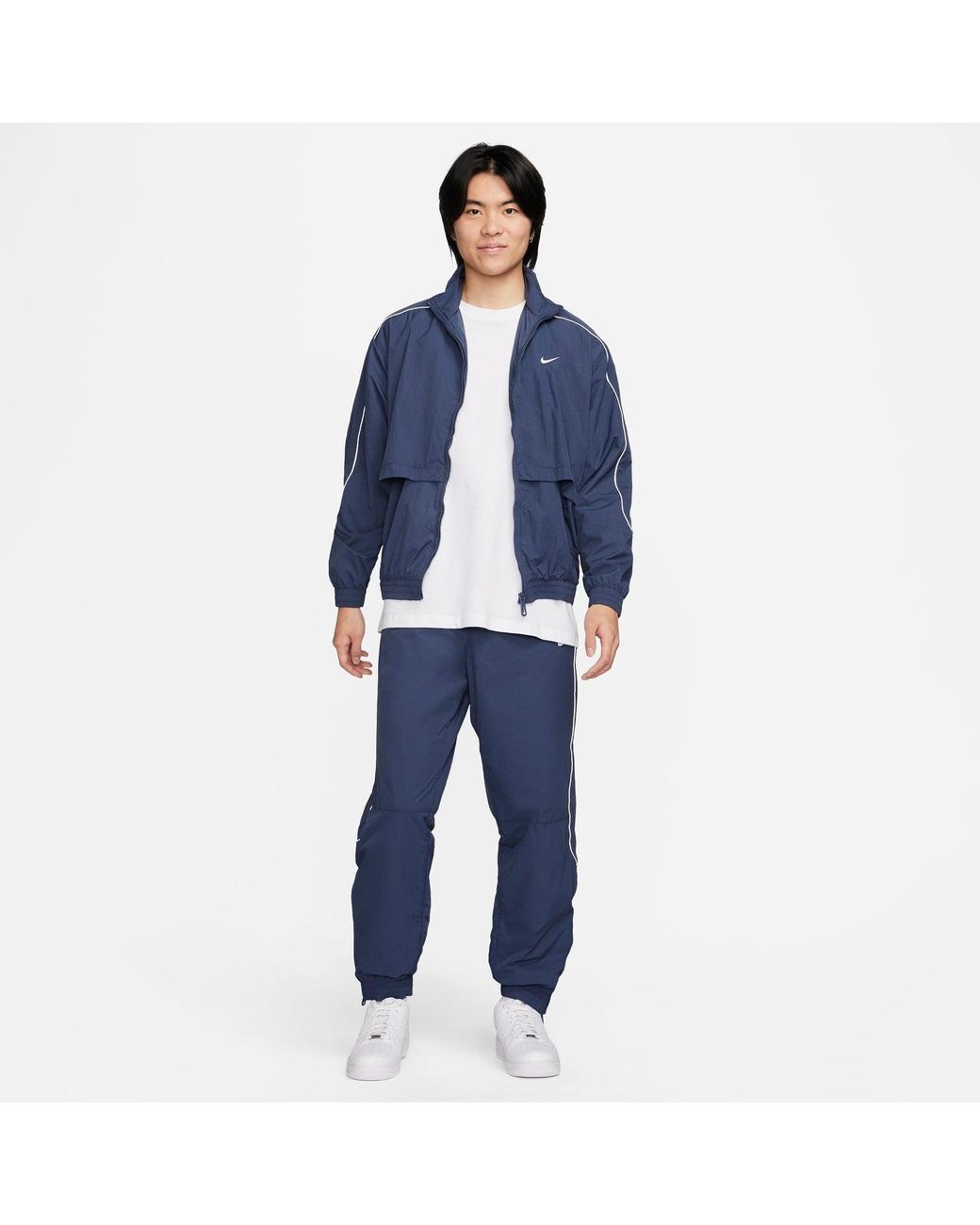 Nike Sportswear Solo Swoosh Woven Track Jacket in Blue for Men | Lyst