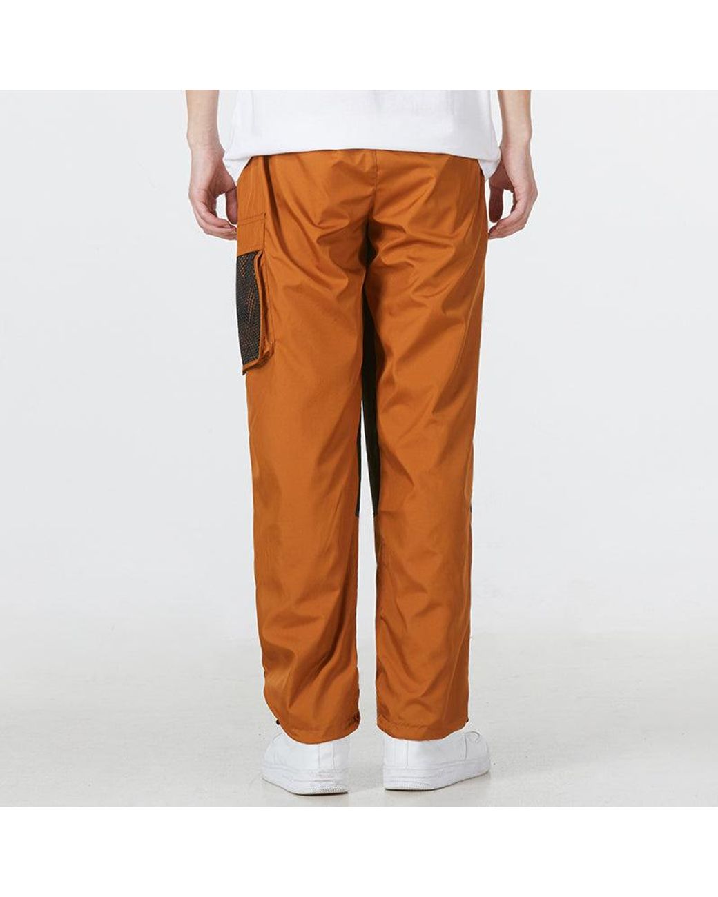 Nike Orange Ss22 Contrast Color Stitching Woven Sports Pants/Trousers/Joggers Copper for men