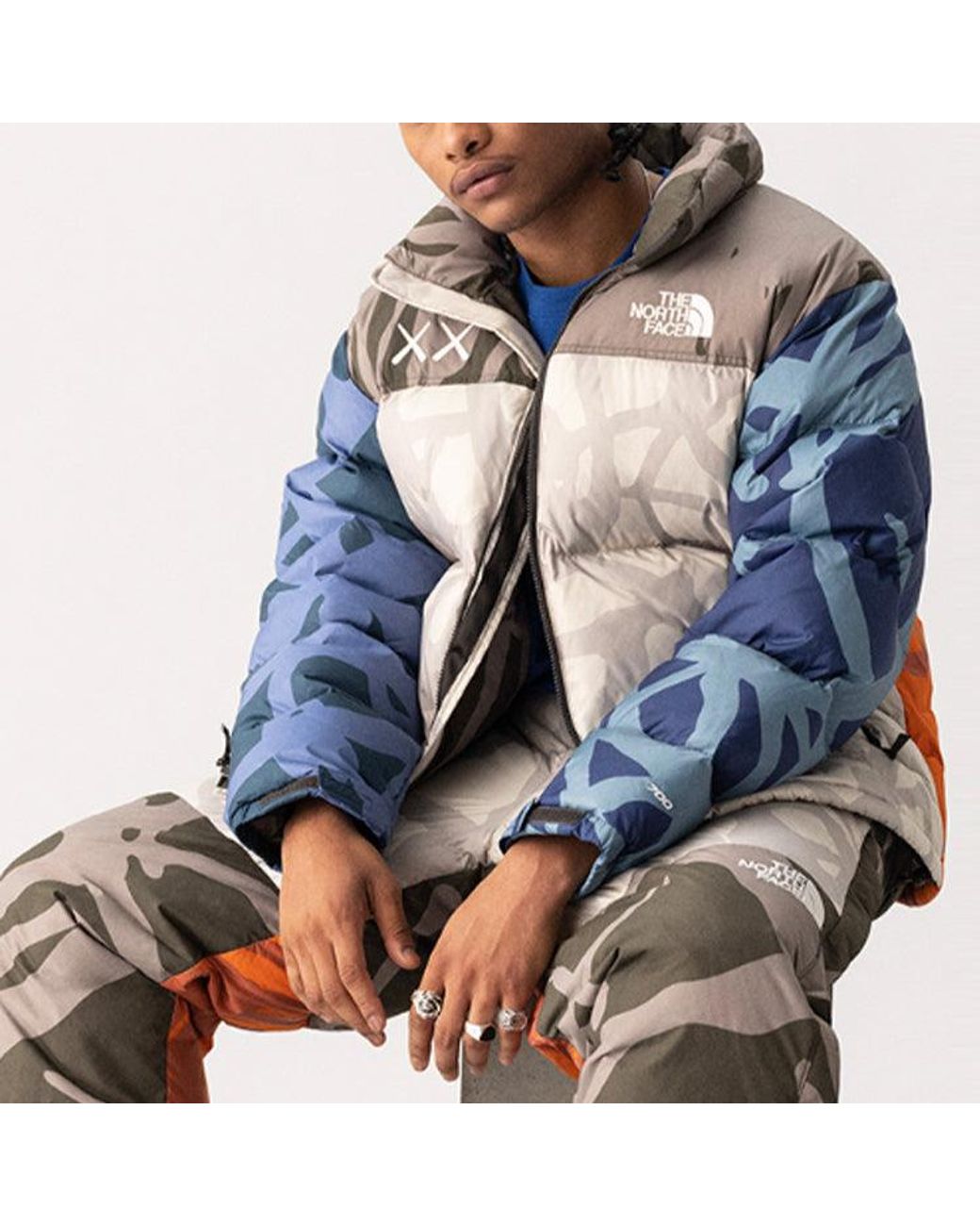 The North Face Blue X Kaws 1996 Nuptse 700 Jacket for men