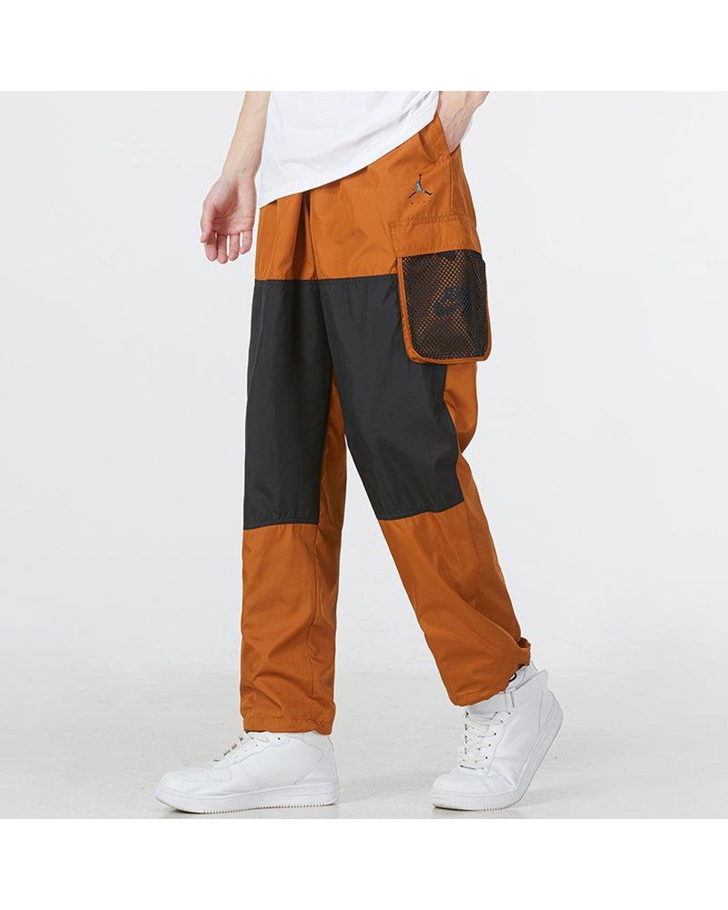 Nike Orange Ss22 Contrast Color Stitching Woven Sports Pants/Trousers/Joggers Copper for men