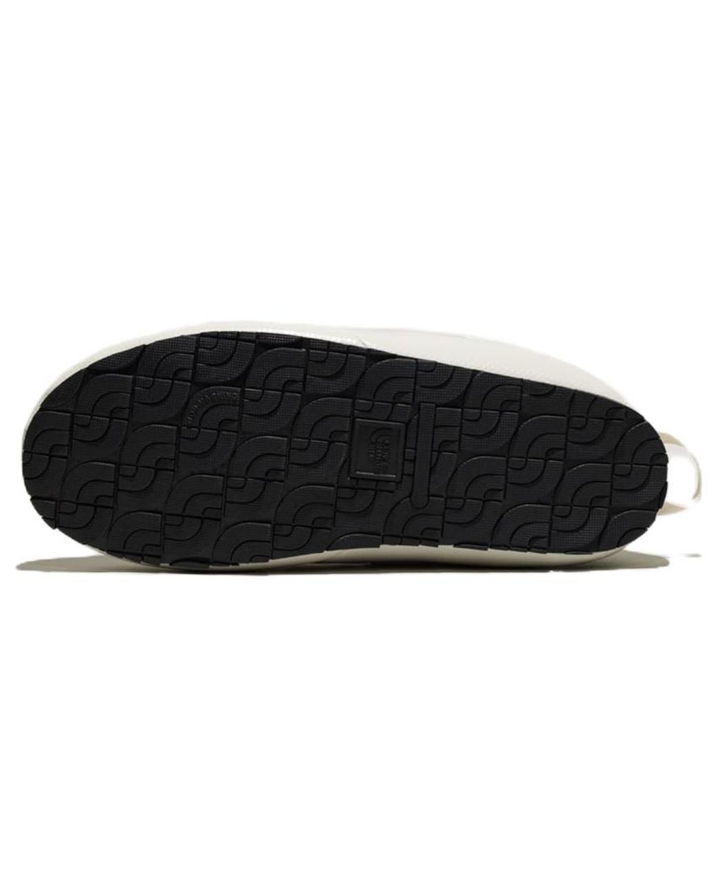 The North Face Black X Kaws Thermoball Traction 'Moonlight Ivory' for men