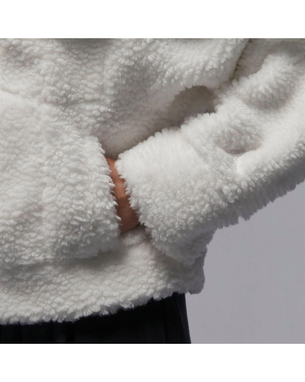 nike white fuzzy jacket