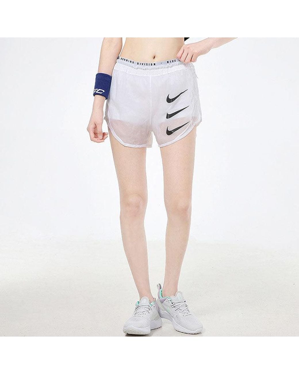 white nike sports shorts