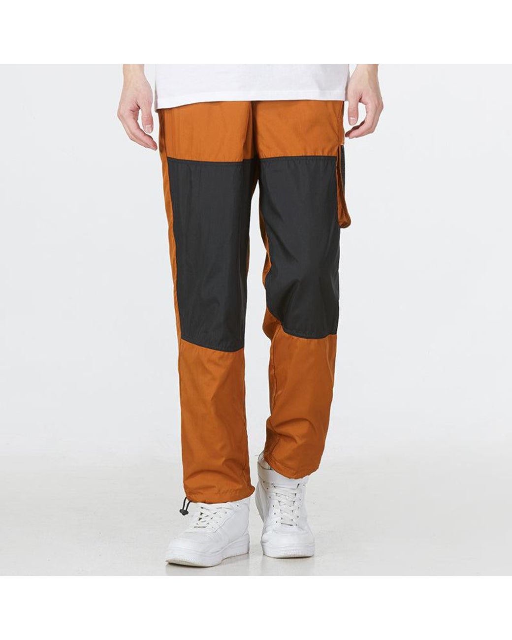 Nike Orange Ss22 Contrast Color Stitching Woven Sports Pants/Trousers/Joggers Copper for men