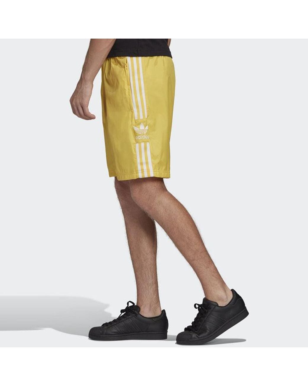 Adidas Yellow Originals Ripstop Ts Sports Shorts for men