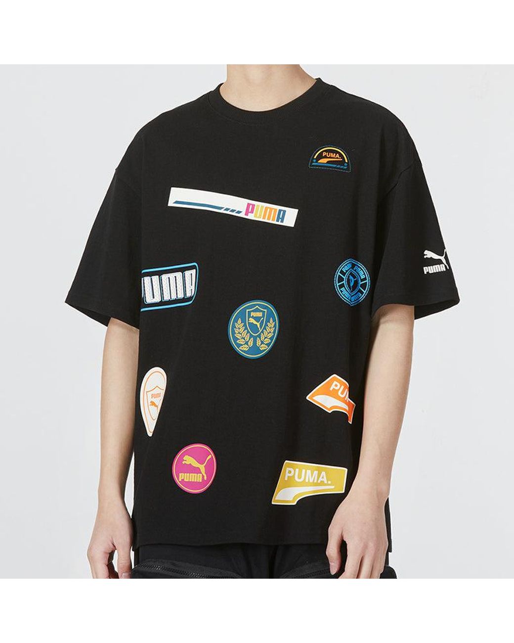 PUMA Black Mix Badge Logo Tee for men
