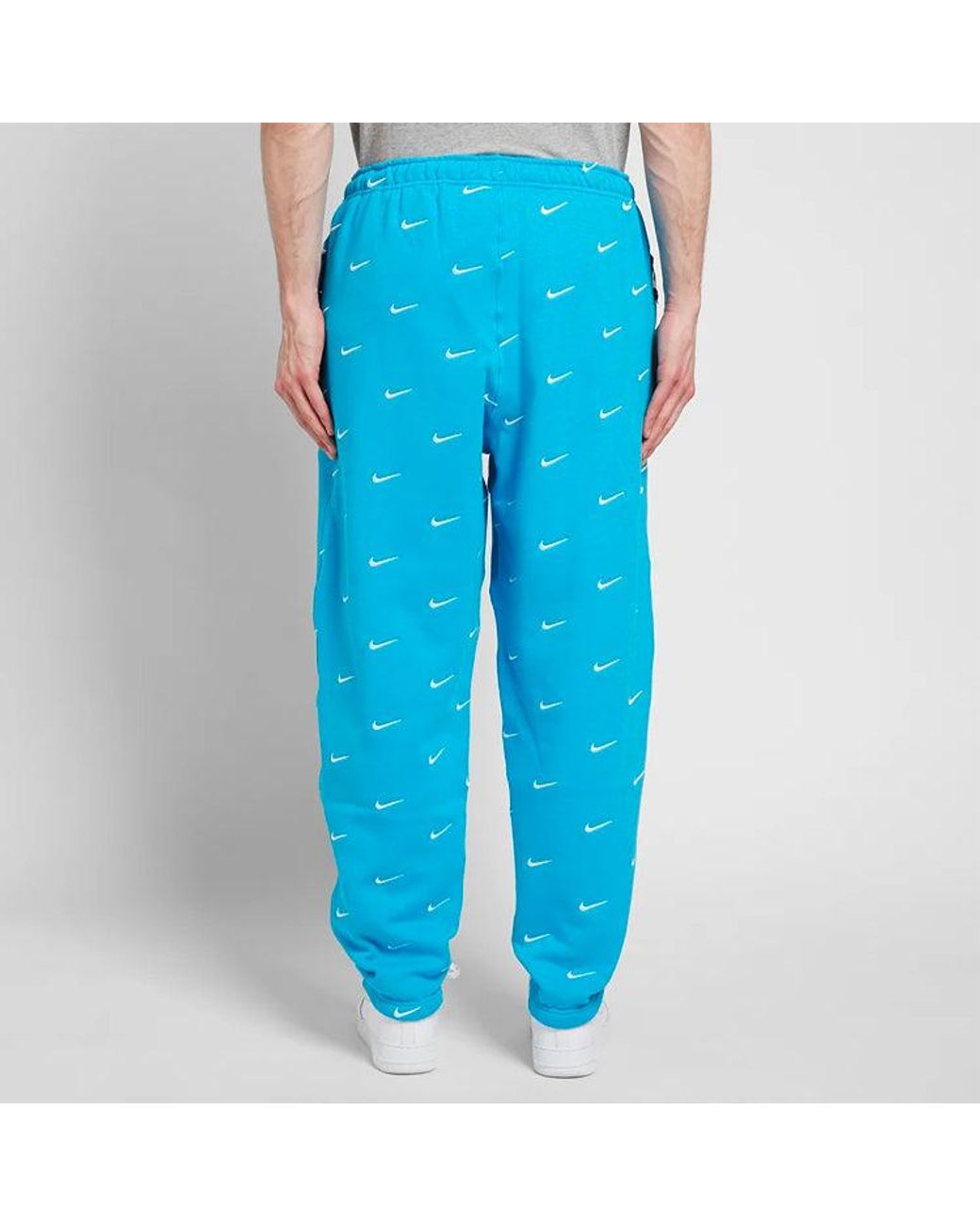 Nike Blue Nrg Swoosh Logo Full Print Straight Sports Pants/Trousers/Joggers for men