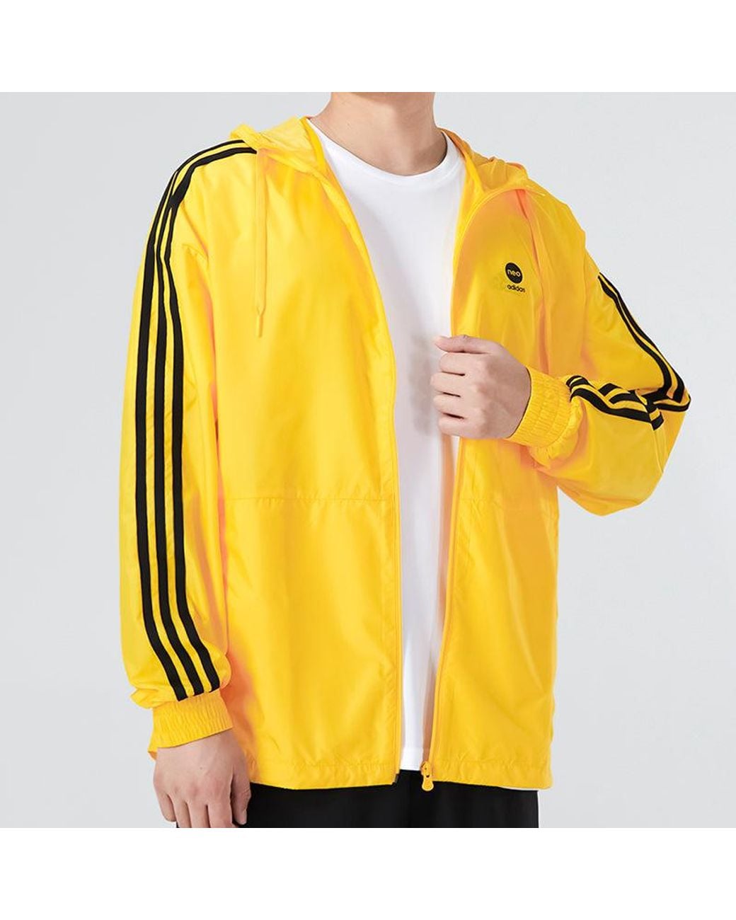 Adidas Yellow Neo Essentials Windbreaker Jackets for men