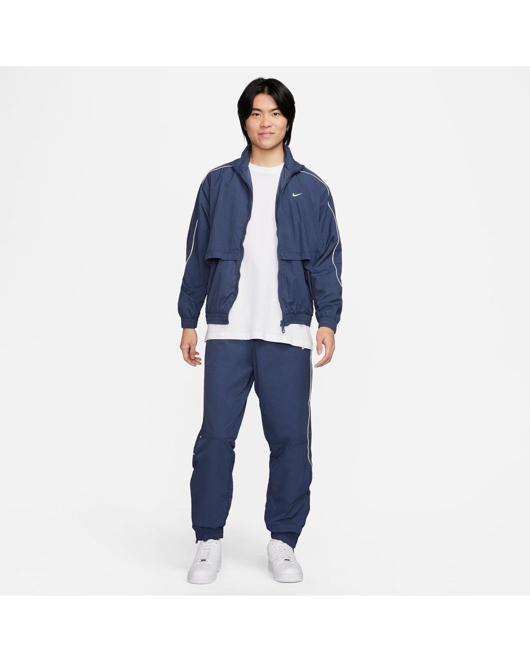 Nike Sportswear Solo Swoosh Woven Track Jacket in Blue for Men | Lyst