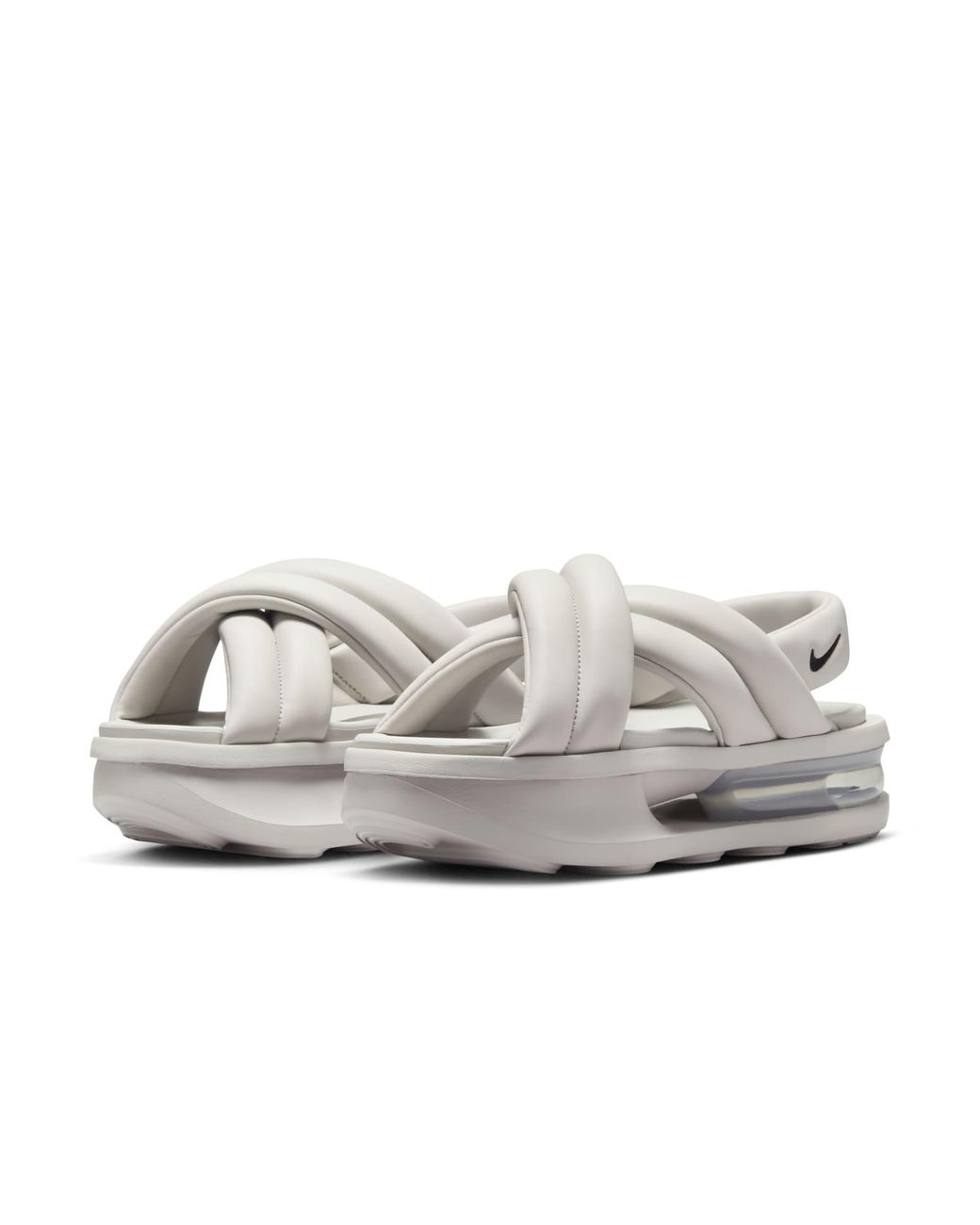 grey and white nike sandals