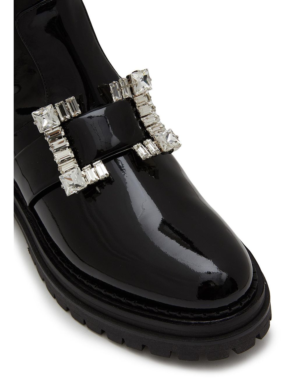 buckled boots in cracked patent leather - black