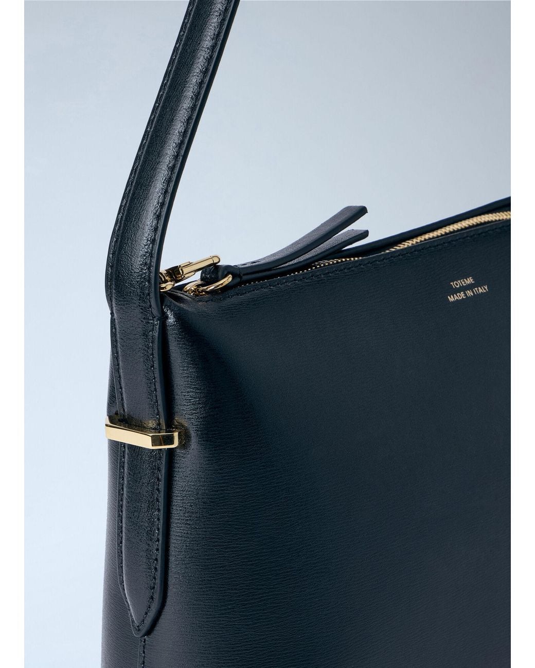 Totême  Blue Bevel Leather Wristlet Handbag