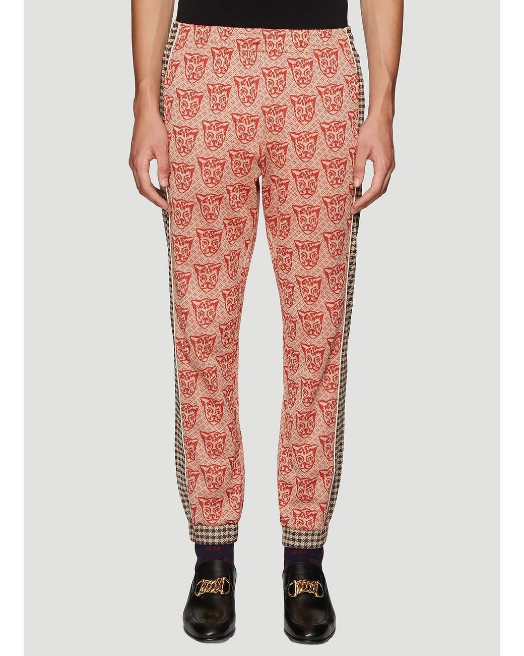 blue and orange track pants