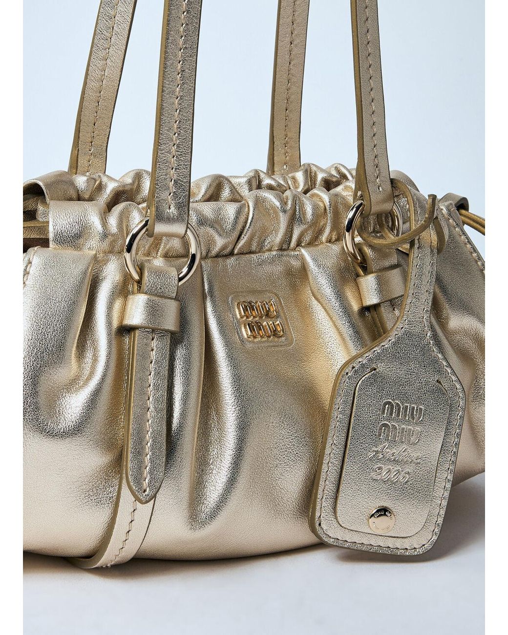 ショルダーバッグ・ポシェット MIU MIU JOIE LEATHER MINI BAG Miu Miu Joie Mini Bag | Gold | FARFETCH