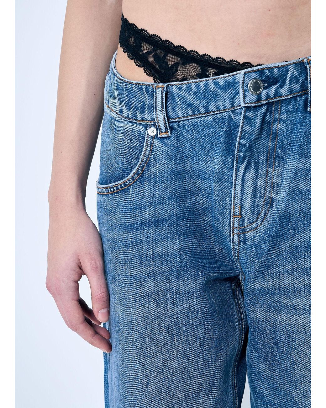 Alexander Wang Dip-Side Jeans With Exposed Lace Underwear in