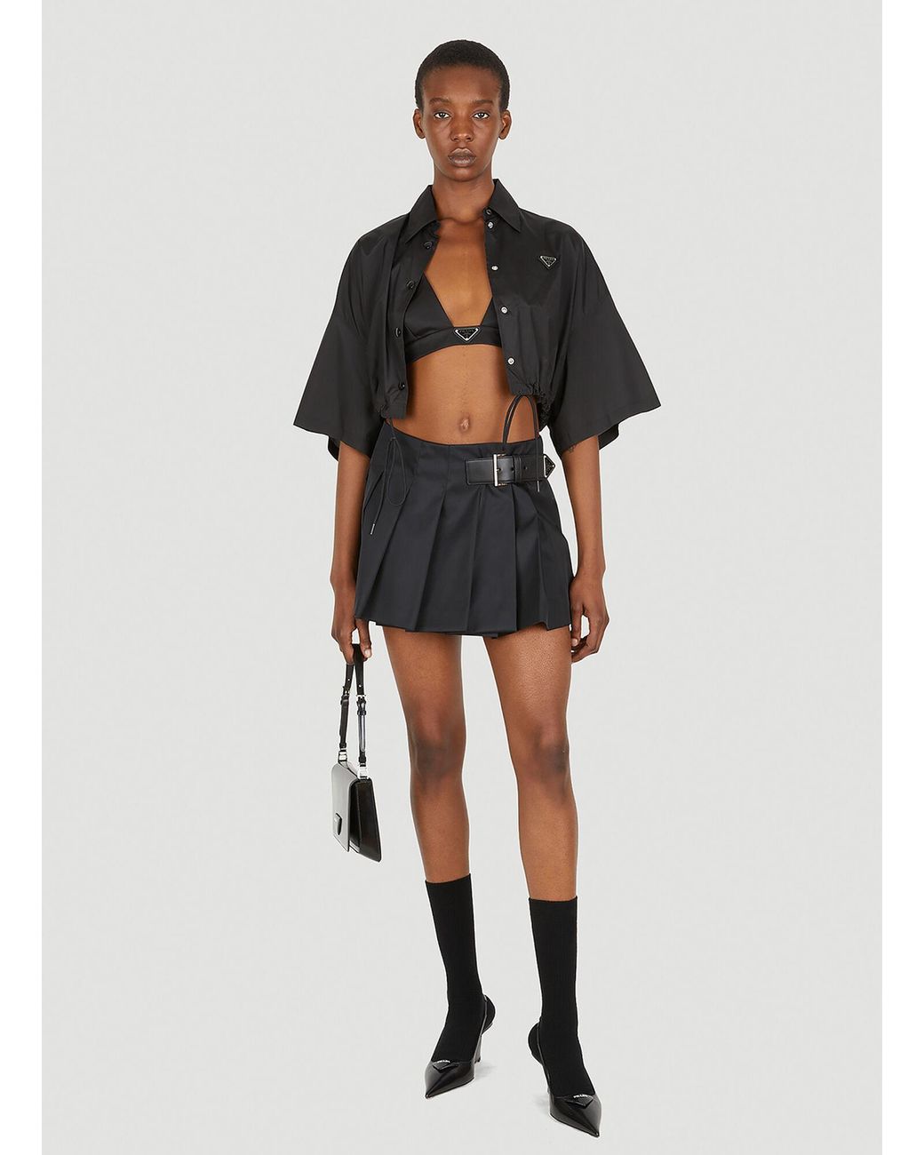 スカート Prada Black mini skirt in Re-Nylon Black Re-nylon Miniskirt | PRADA