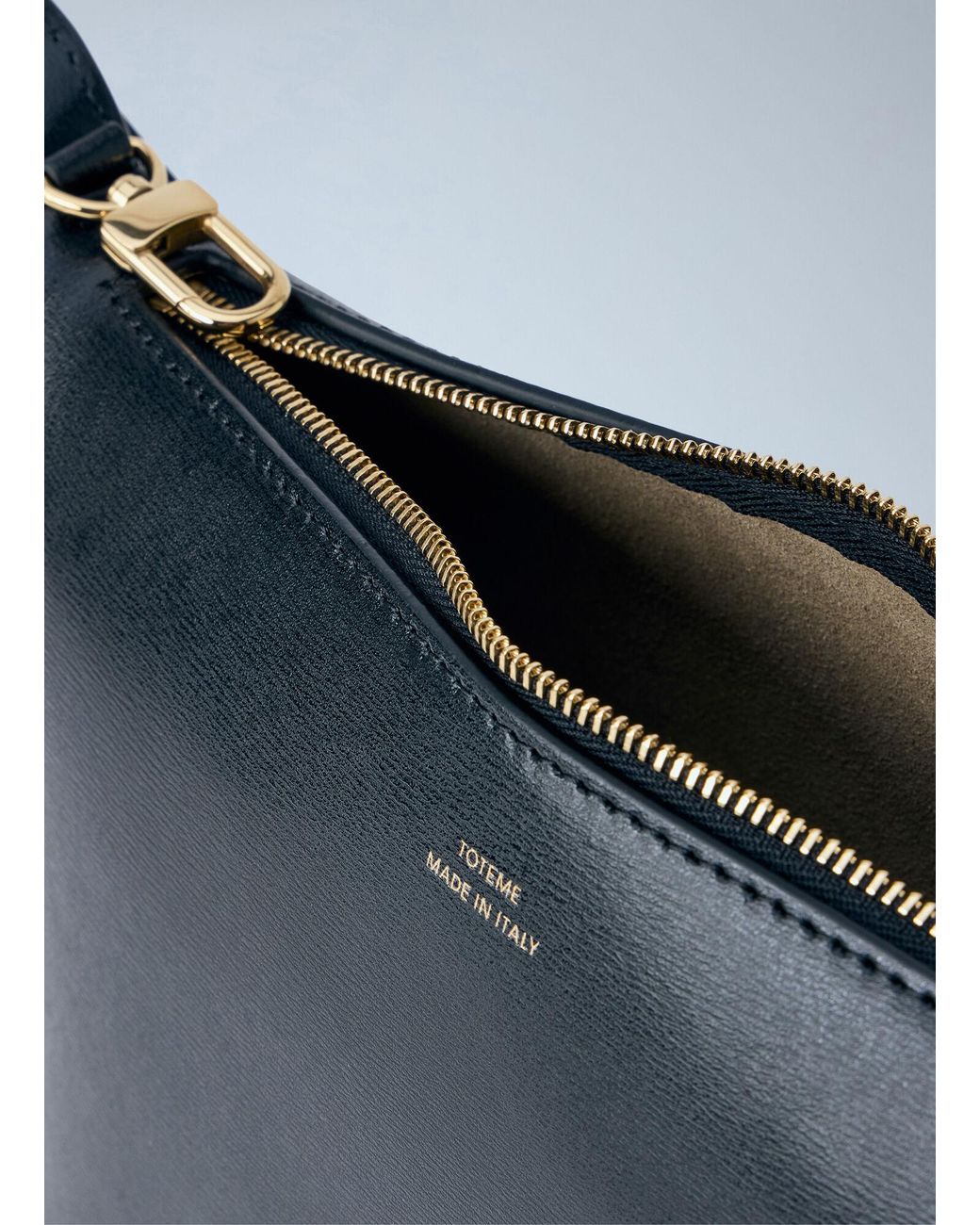 Totême  Blue Bevel Leather Wristlet Handbag
