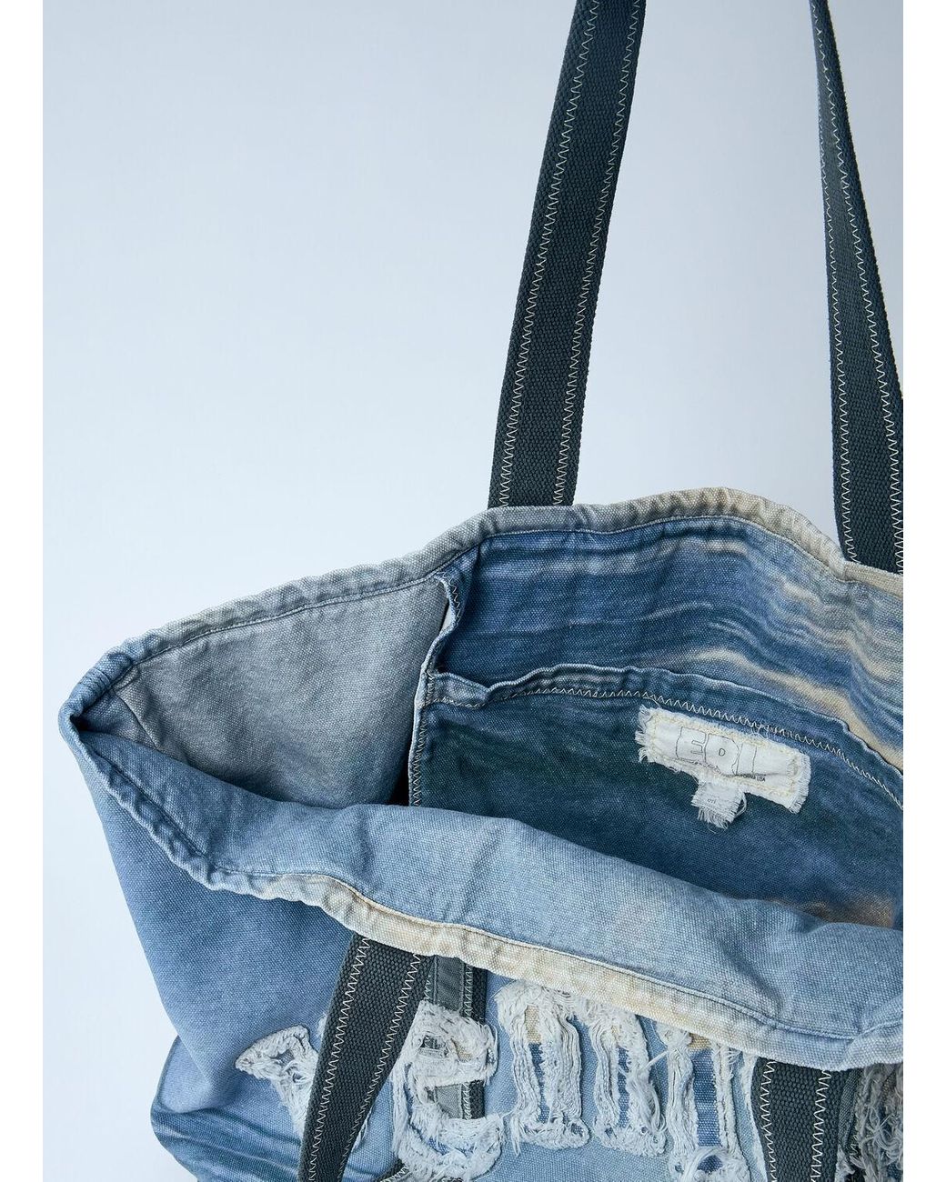バッグ ERL Men's Venice Tote Woven ERL Venice frayed-detail Tote Bag | Blue | FARFETCH