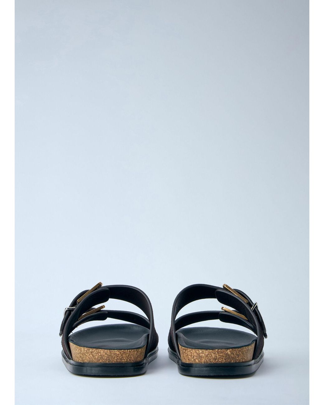 The Row Black Buckle Slides