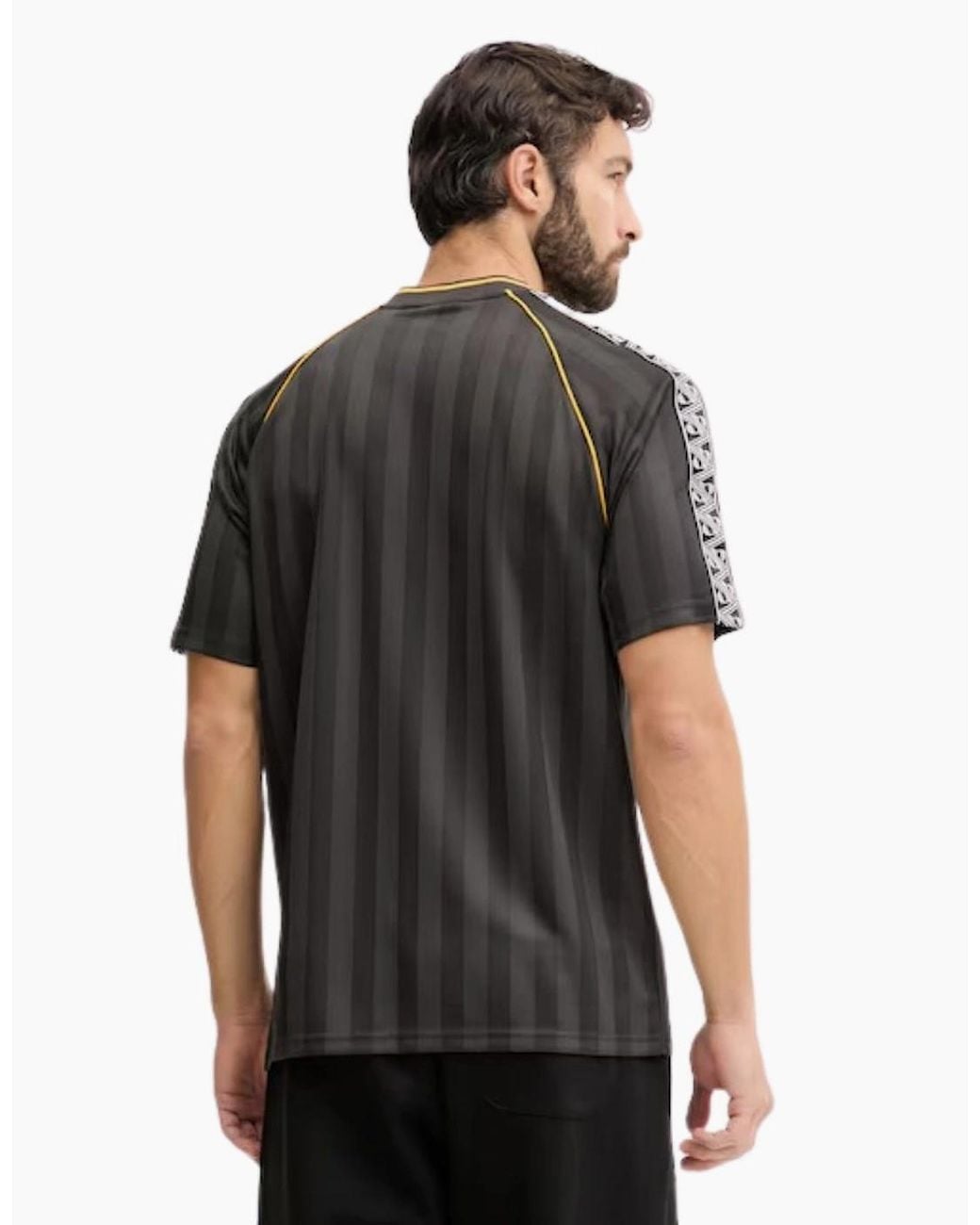 PUMA Black Kind Relaxed Football Jersey Top for men