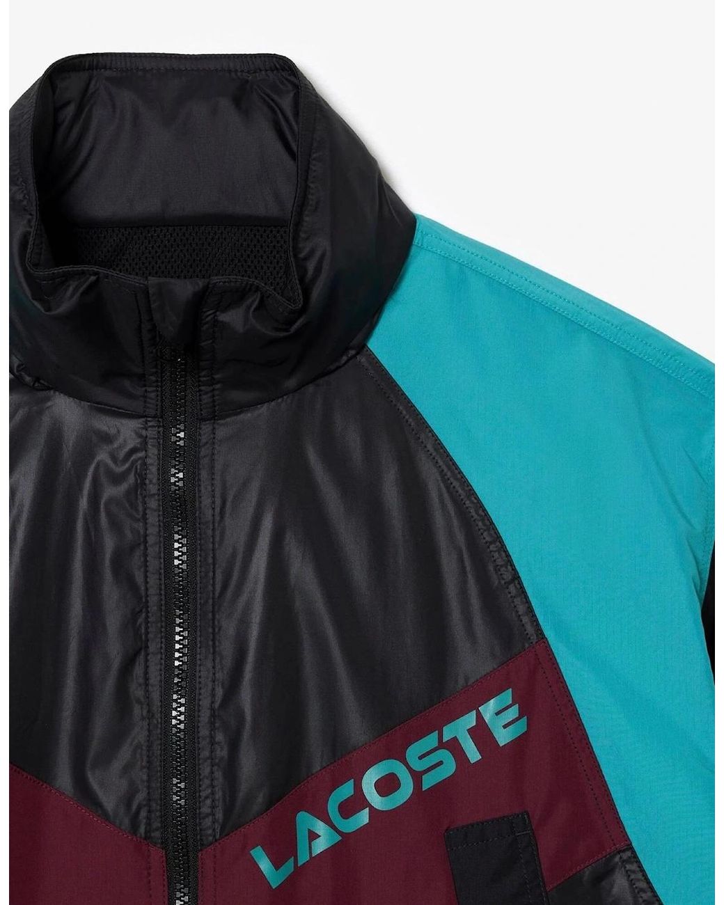 Lacoste Blue Hooded Neck Color Block Patterned Windbreaker With Zipped Pocket