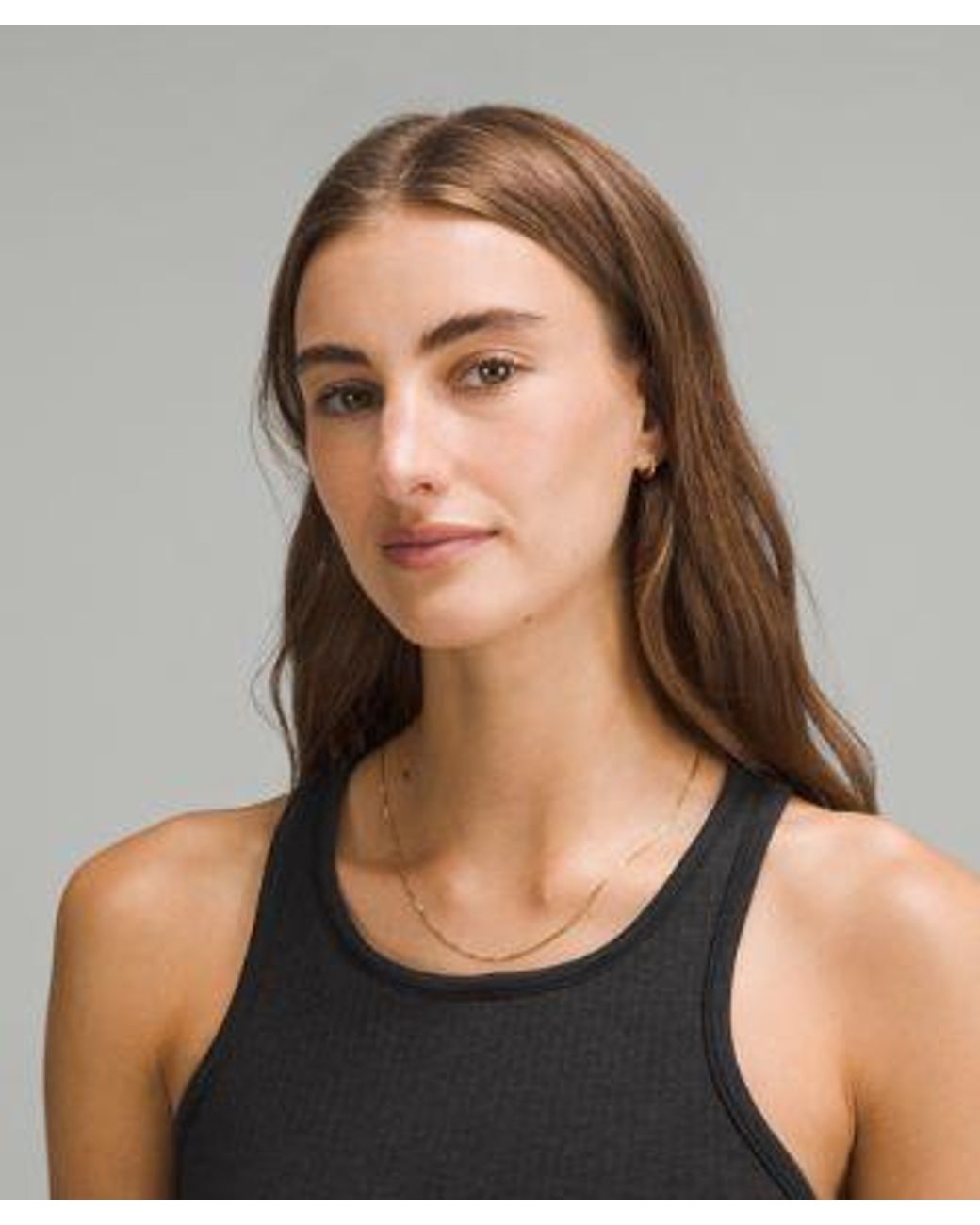 lululemon athletica Ebb To Street Cropped Racerback Tank Top - Color Black - Size 10