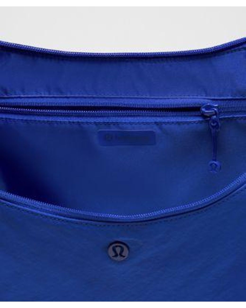 lululemon athletica Blue – Large Slouchy Sling Bag 13L –