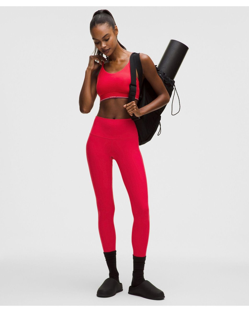 lululemon Flow Y Mid-Support Bra Logo in Red | Lyst