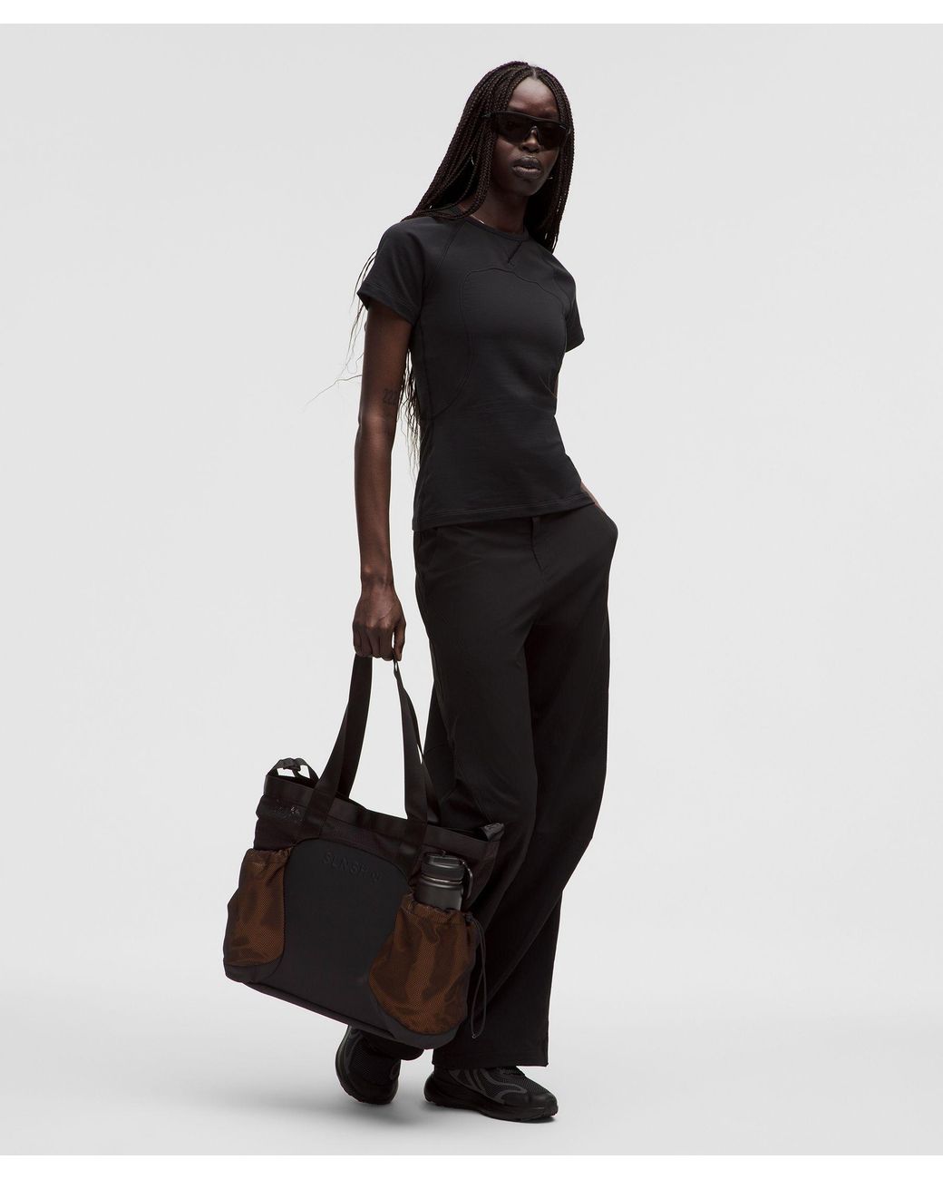 lululemon cinch bag black Unisex Convertible Ruched Crossbody 16L Drawcord Sides On This Compact Cross Lululemon Drawstring Bag | TikTok