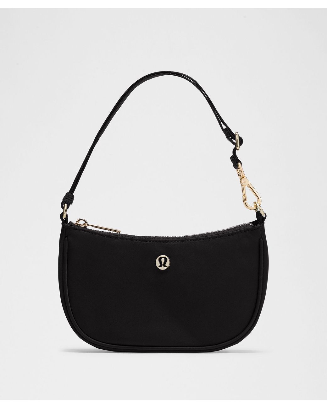 lululemon black and gold bag On My Level Tote 20L Auto Kicks PH This lululemon Crossbody Camera Bag offers a sleek and contemporary way to carry your essentials while repping the Vegas Golden Knights This cross Lululemon Athletica Bags | Brand