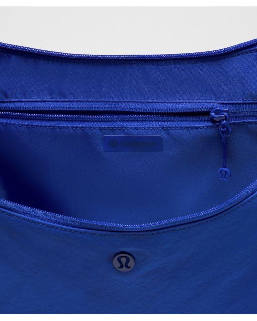 lululemon athletica Blue – Large Slouchy Sling Bag 13L –