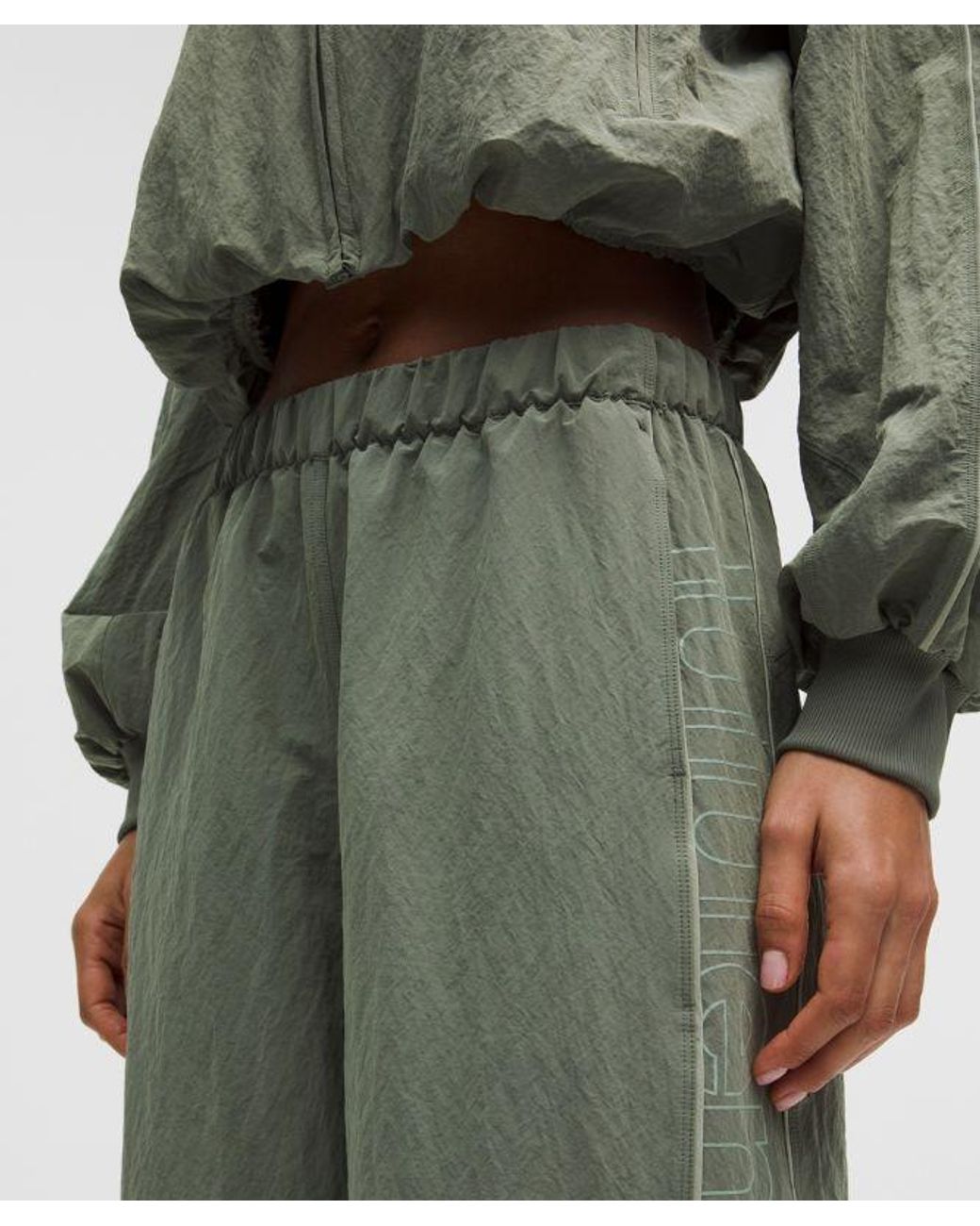 lululemon athletica Green – Crinkle Nylon Mid-Rise Track Pants Wordmark – – Size Medium