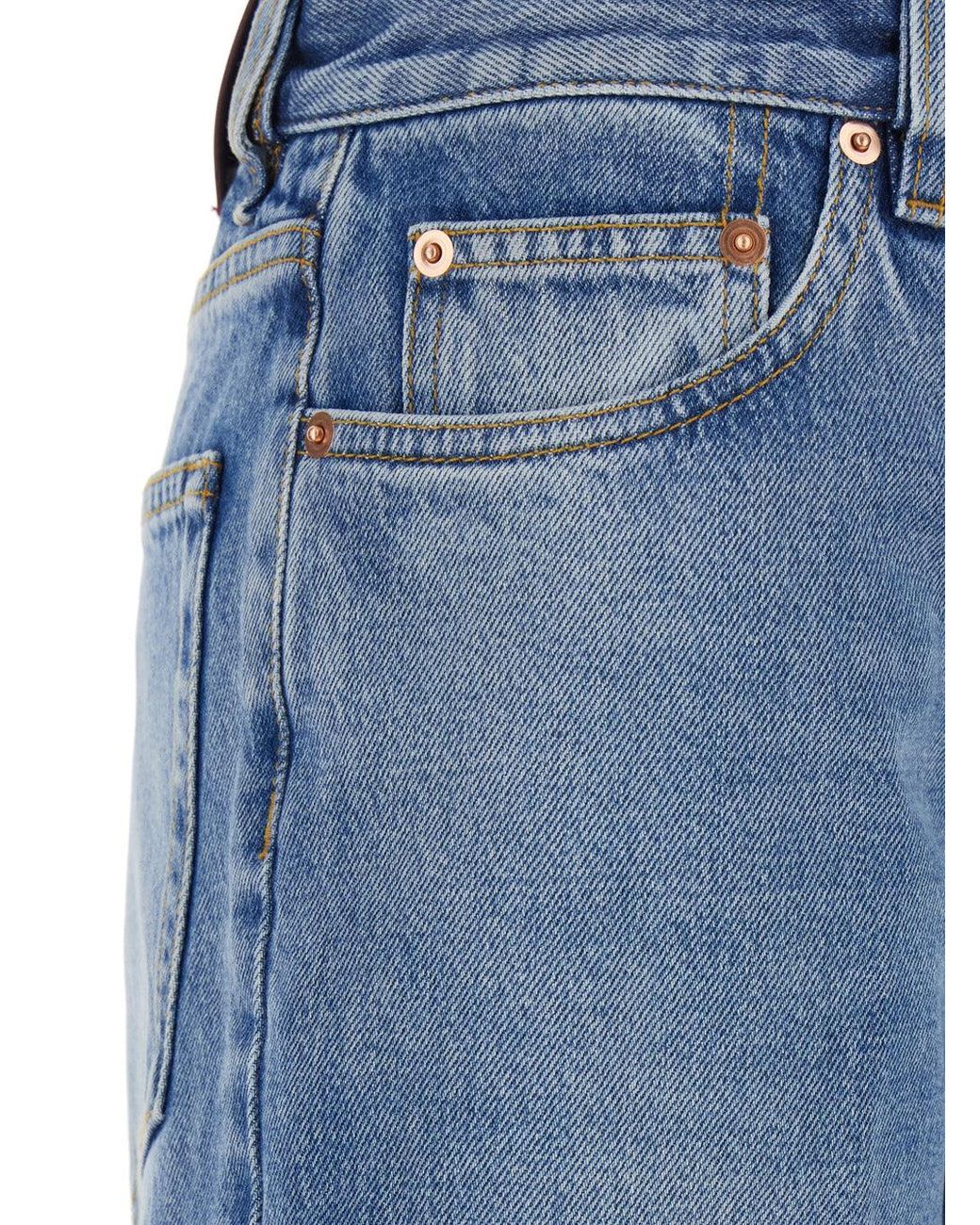 Gucci Blue Jeans With Logo Patch On The Rear And Faded Effect