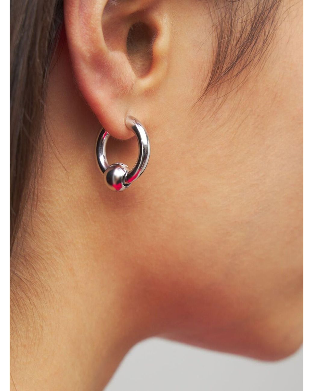 Balenciaga Force Xs Hoop Earrings in Metallic | Lyst
