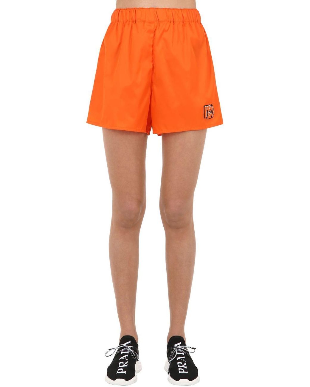 Prada Logo Patch Nylon Shorts in Orange | Lyst