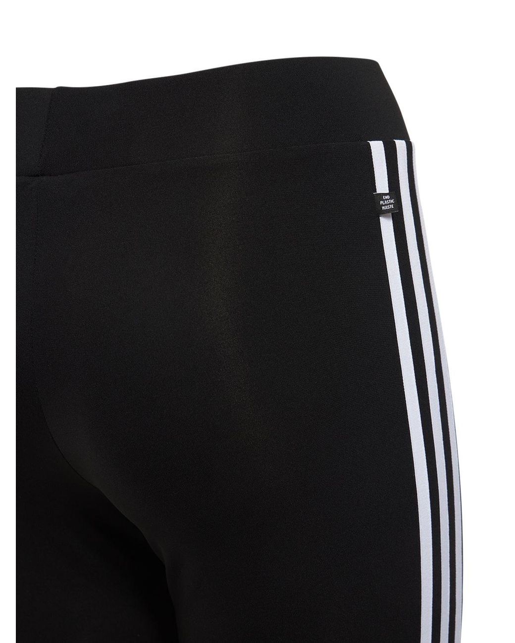adidas Originals ESSENTIALS FLARED - Leggings - Trousers - black