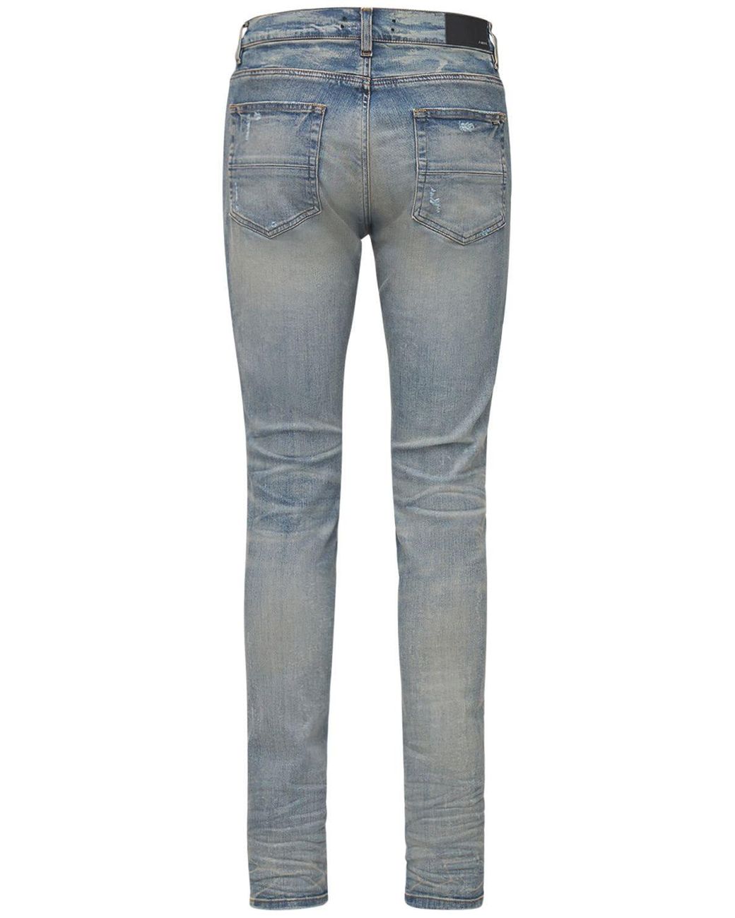 Amiri Varsity Patch Denim Jeans in Blue 