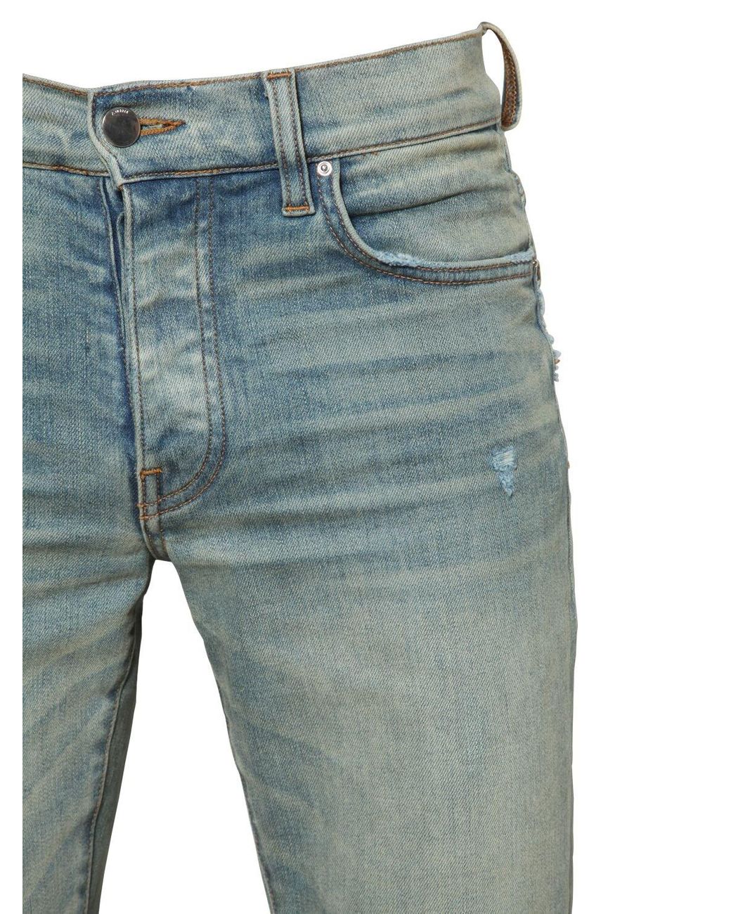 Amiri 27cm Flared Stack Cotton Denim Jeans in Blue for Men Amiri 27cm Flared Stack Cotton Denim Jeans in Blue for Men
