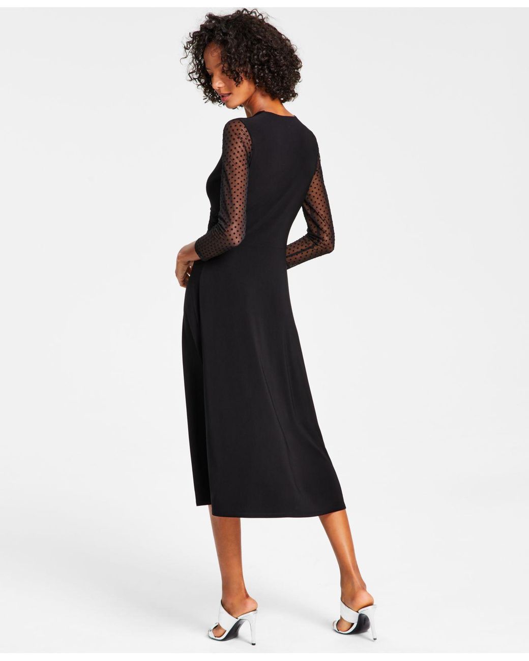 Black midi dress with sheer outlet sleeves