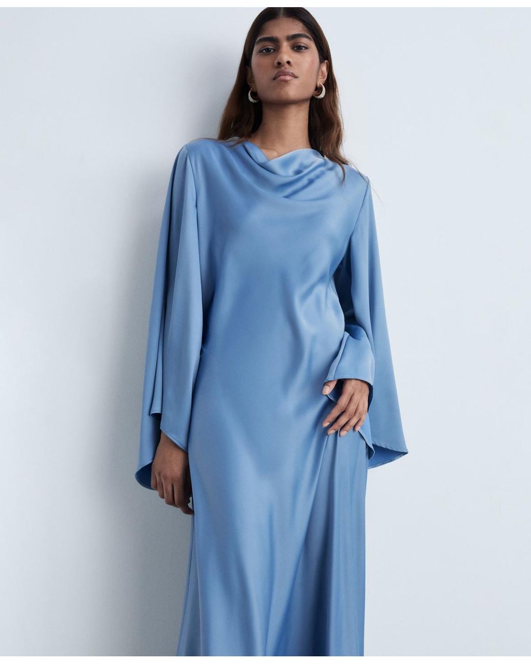 princess polly baby blue dress Elegant royal blue silk satin gown featuring long sleeves, intricate  embellishments on the corset, a high slit, and a flowing train for a touch  of glamour.” #starline, #jeancharleszakaria s25 #couture collection  available