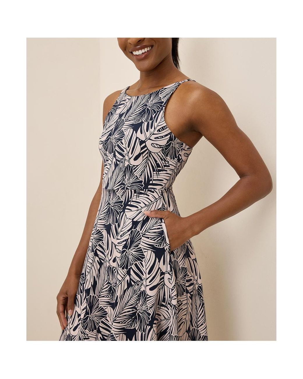 green emerald velvet dress PACT Women's Fit & Flare Petal Sleeve Dress, Black at Amazon Women's  Clothing store main image 1