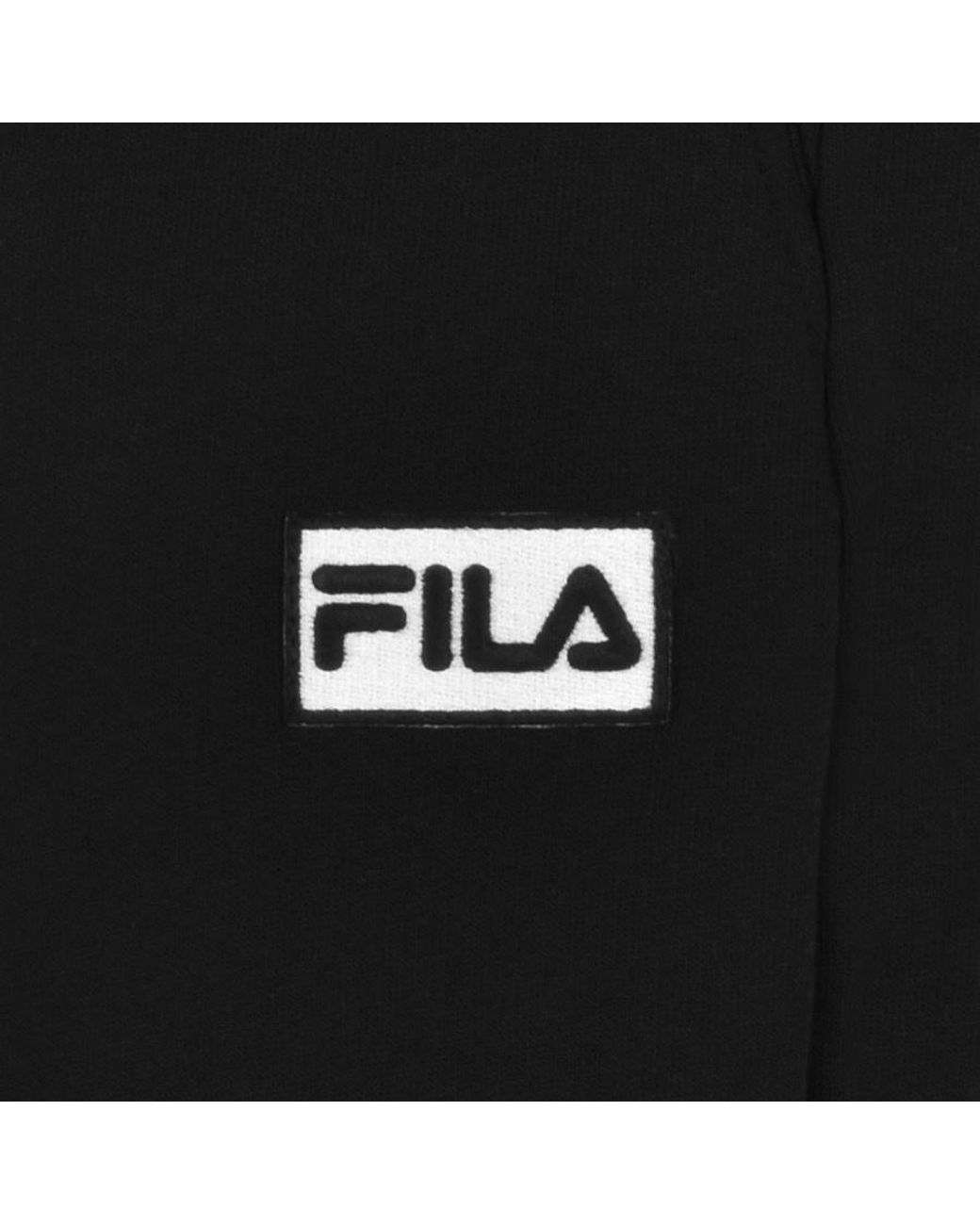 Fila griffin sale woven track top