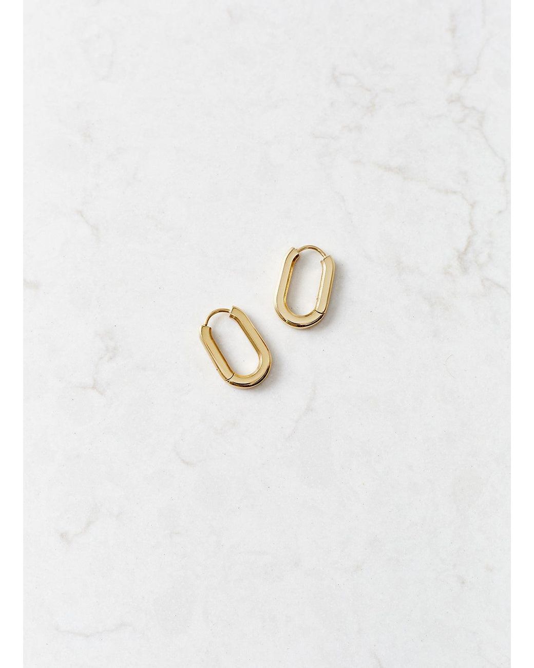 Melissa Odabash White Oval Hoop Huggy Earrings