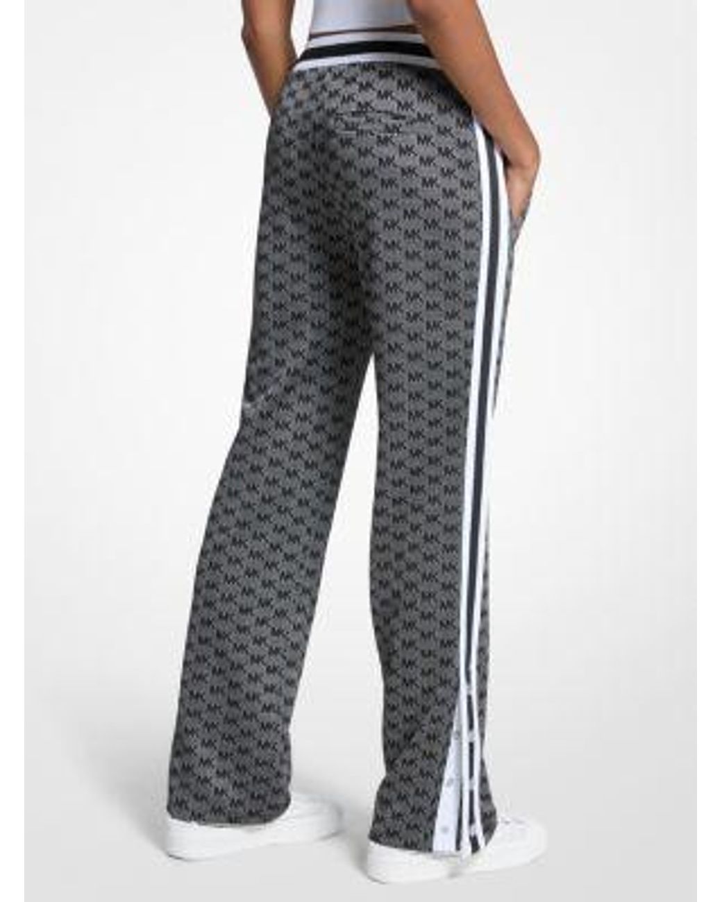 Michael Kors Logo Print Metallic Stretch Knit Track Pants in Blue