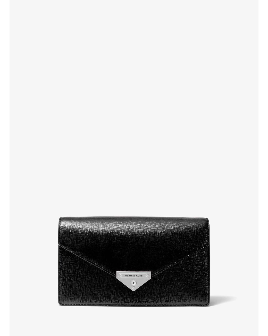 Bolso de mano tipo sobre mediano de charol Michael de color Negro | Lyst