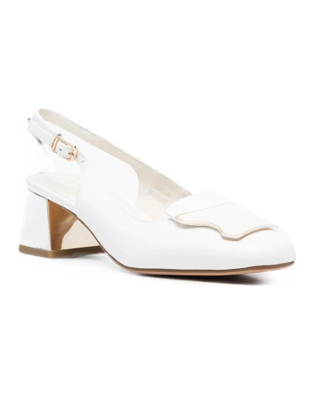 Linda Baumann White Pumps
