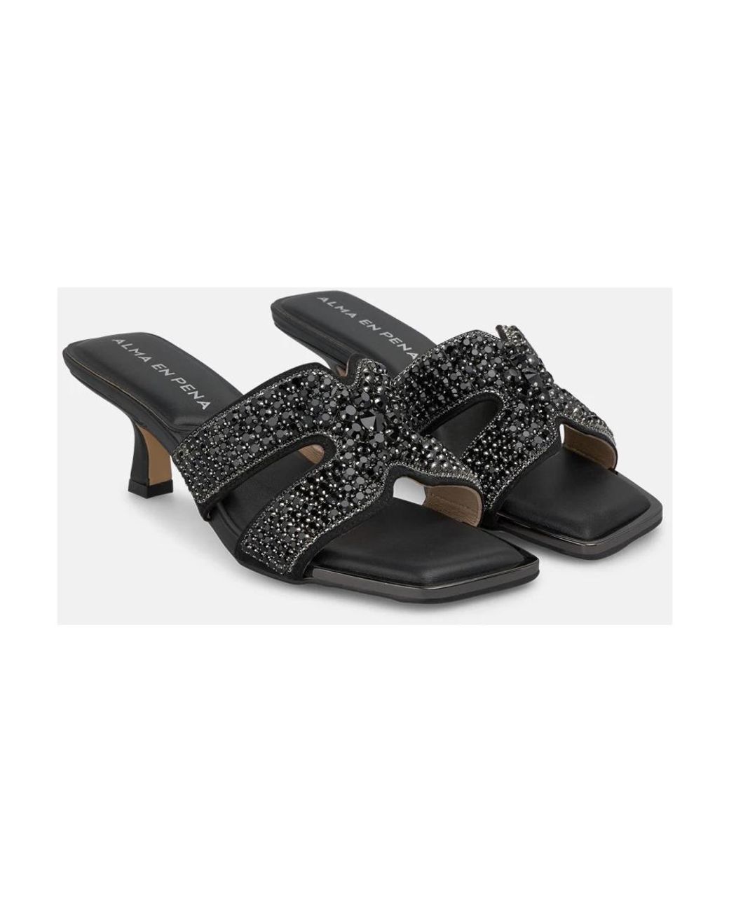 Alma En Pena. Black Heeled Mules