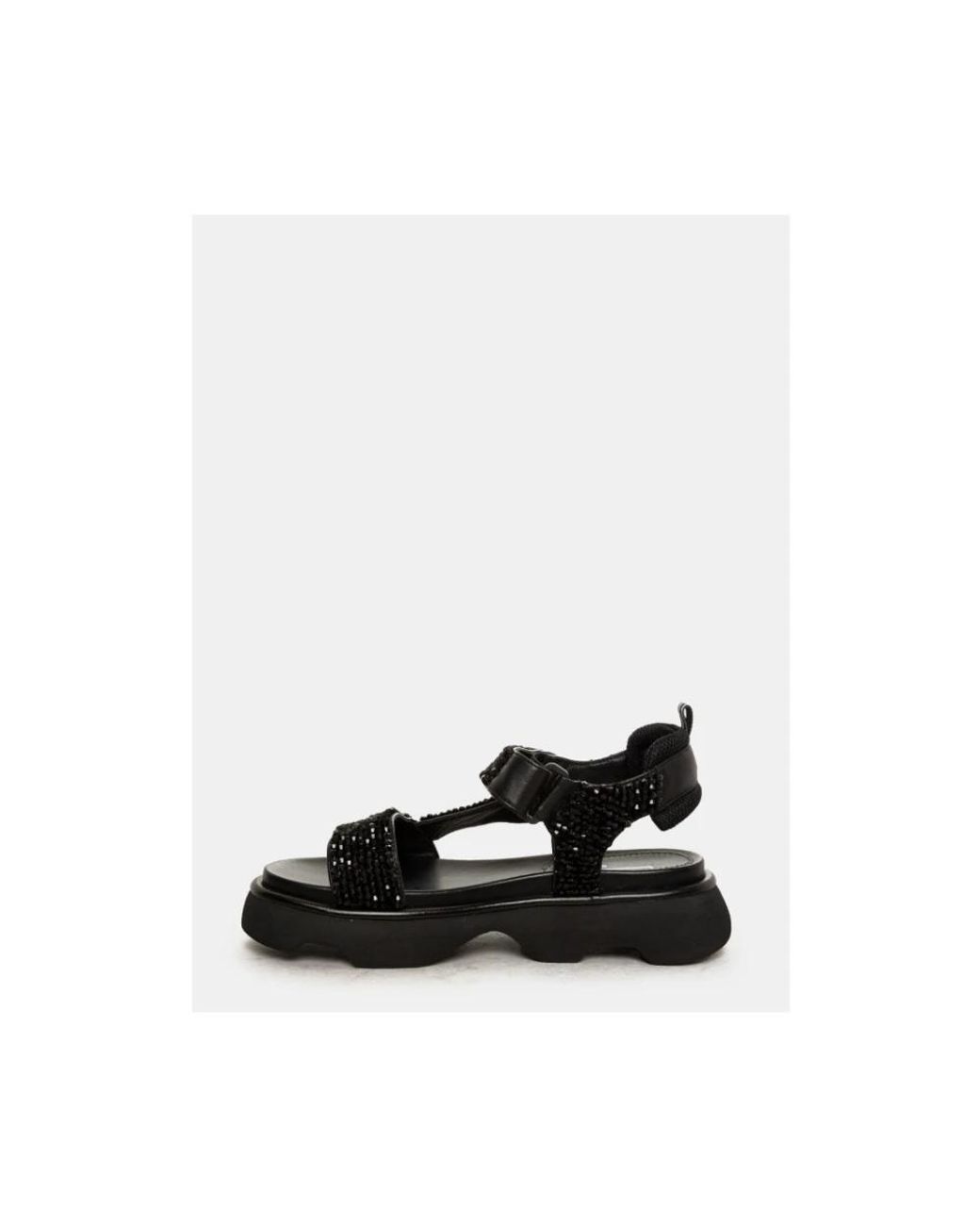Jeannot Black Flat Sandals