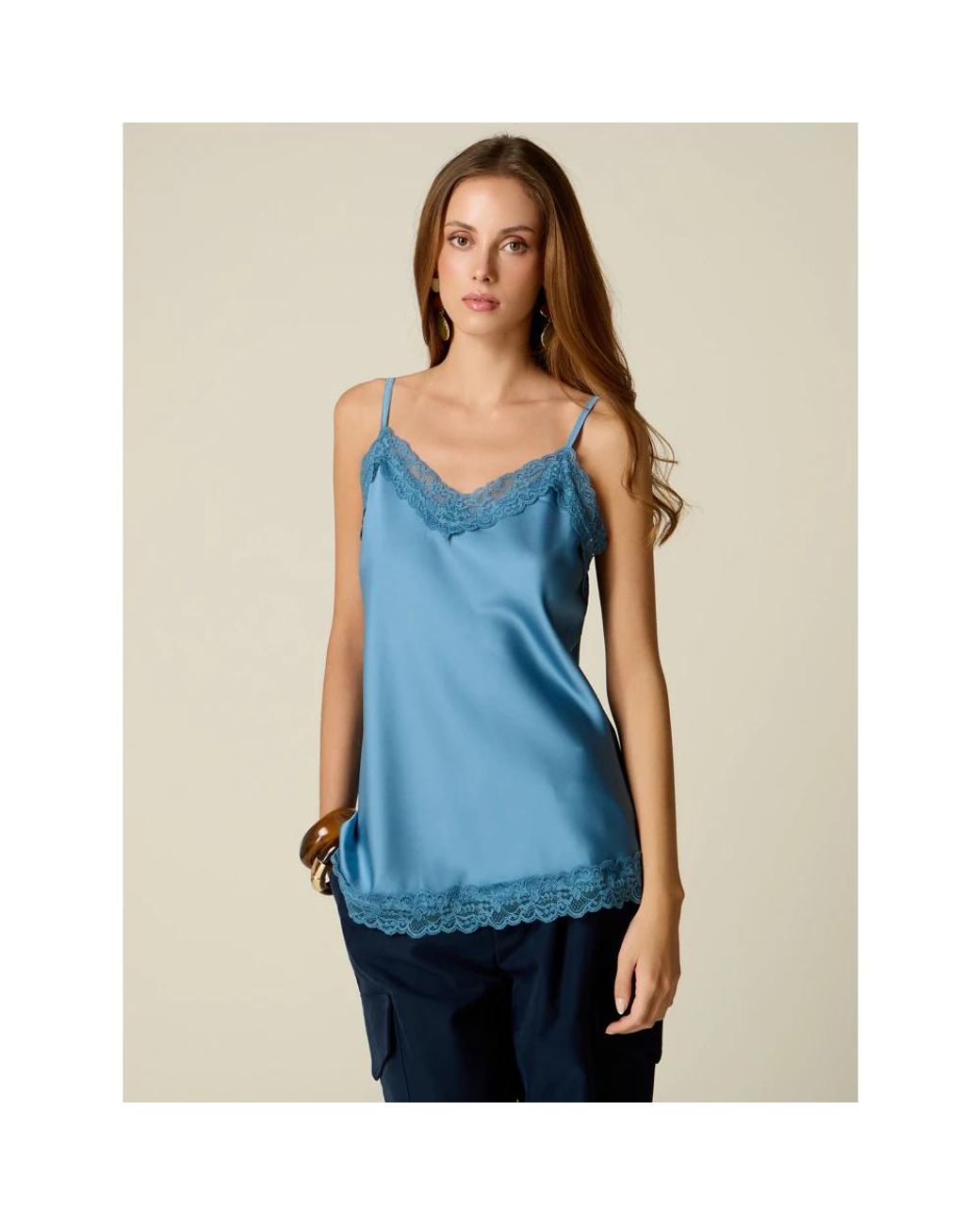 Sleeveless Tops Oltre de color Blue