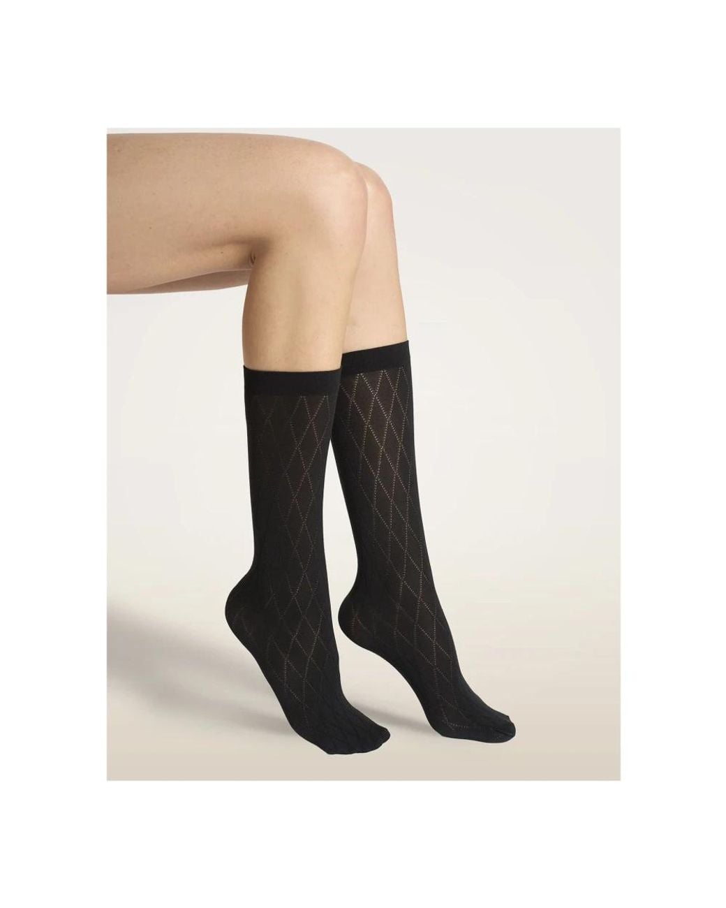 Socks Wolford en coloris Black